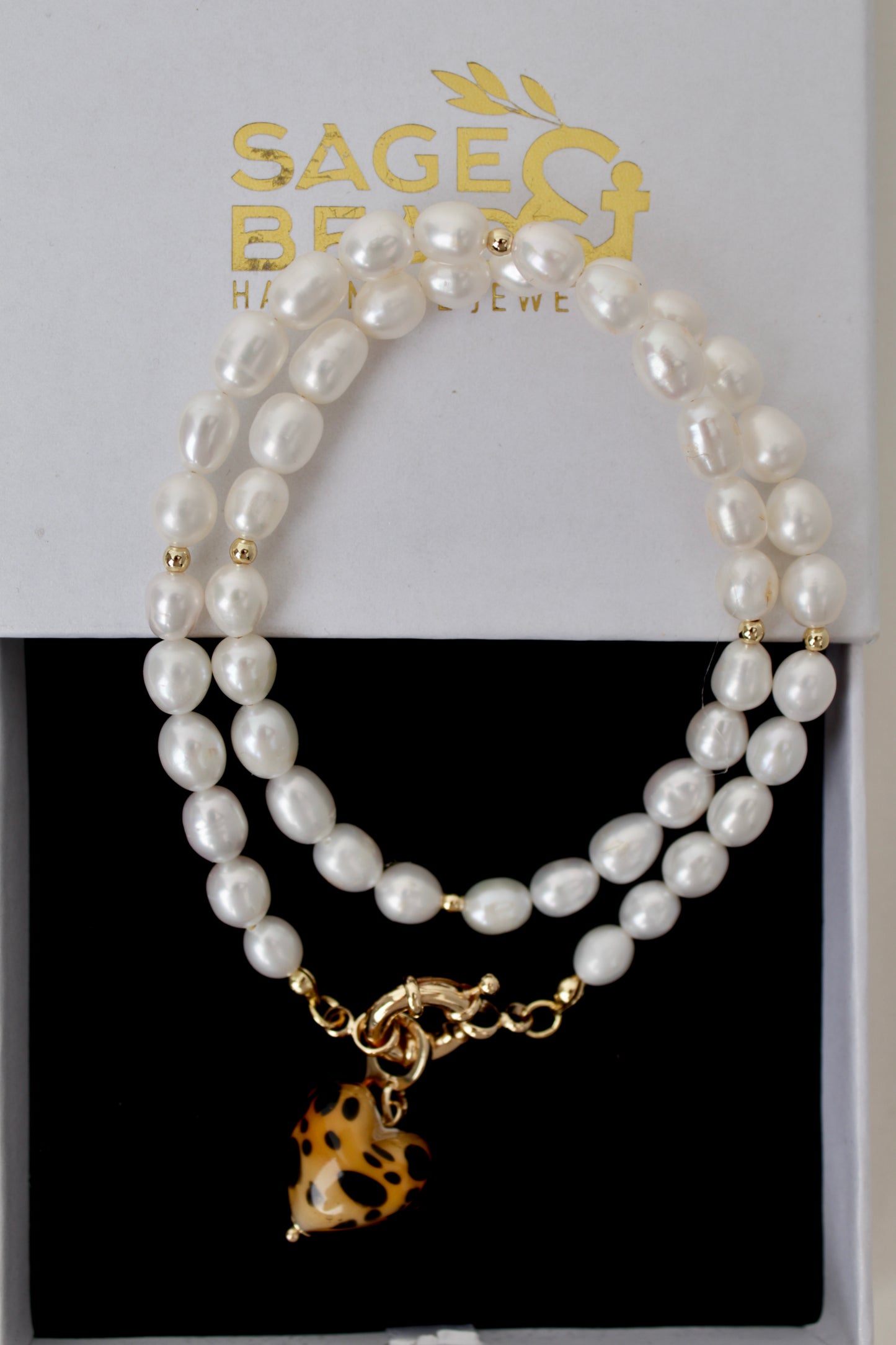 Amore - Pearl necklace with removable heart charm