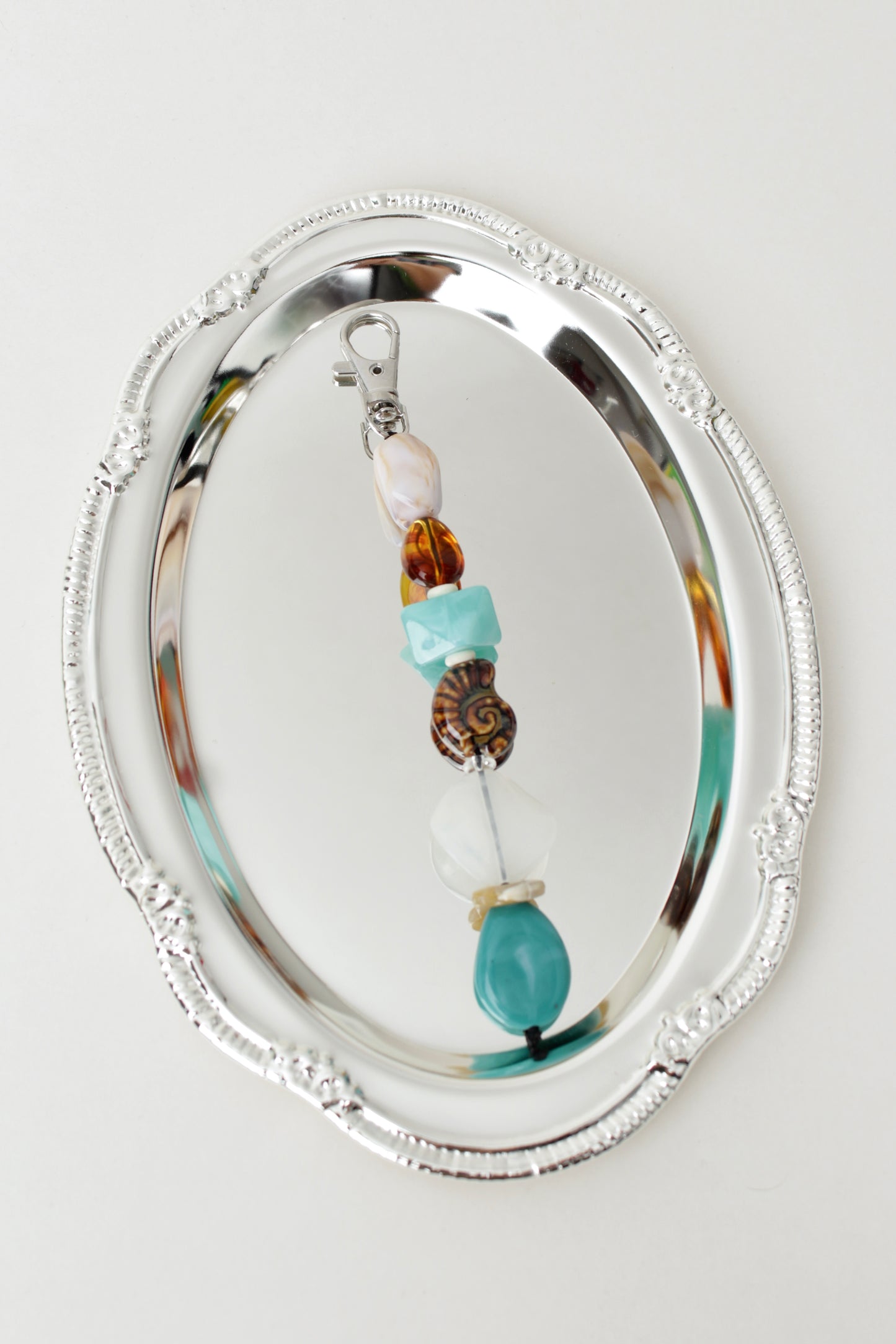 Turquoise and brown Beads Bag Charm.